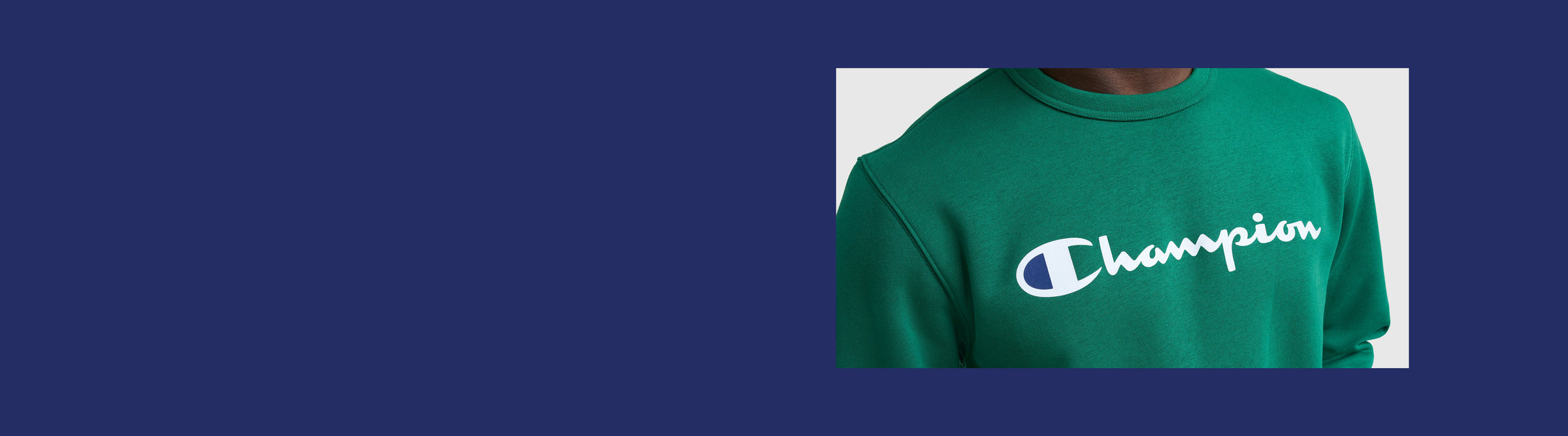 Green sweatshirt with Champion logo on a blue background