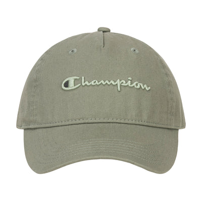 The Champion Script Embroidery Adjustable Cap is made from khaki green washed cotton twill, with light thread script embroidery on the front, a curved brim, visible stitching, and an adjustable strap for the perfect fit.