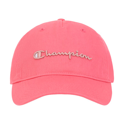 The Champion Script Embroidery Adjustable Cap is a bright pink washed cotton twill hat featuring white cursive Champion script on the front and an adjustable strap for comfort.