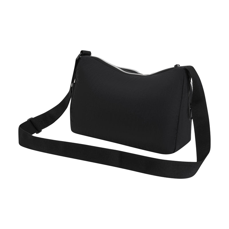The Champion Quartz Small Messenger Bag, made of black lightweight nylon with a long adjustable strap, is shown from the back and slightly to the side against a white background.