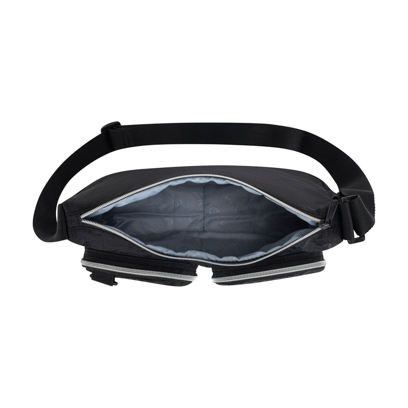 Top view of the Champion Quartz Small Messenger Bag in black nylon, featuring a wide zipper, spacious light gray interior, and adjustable strap. The empty travel bag is set against a white background.