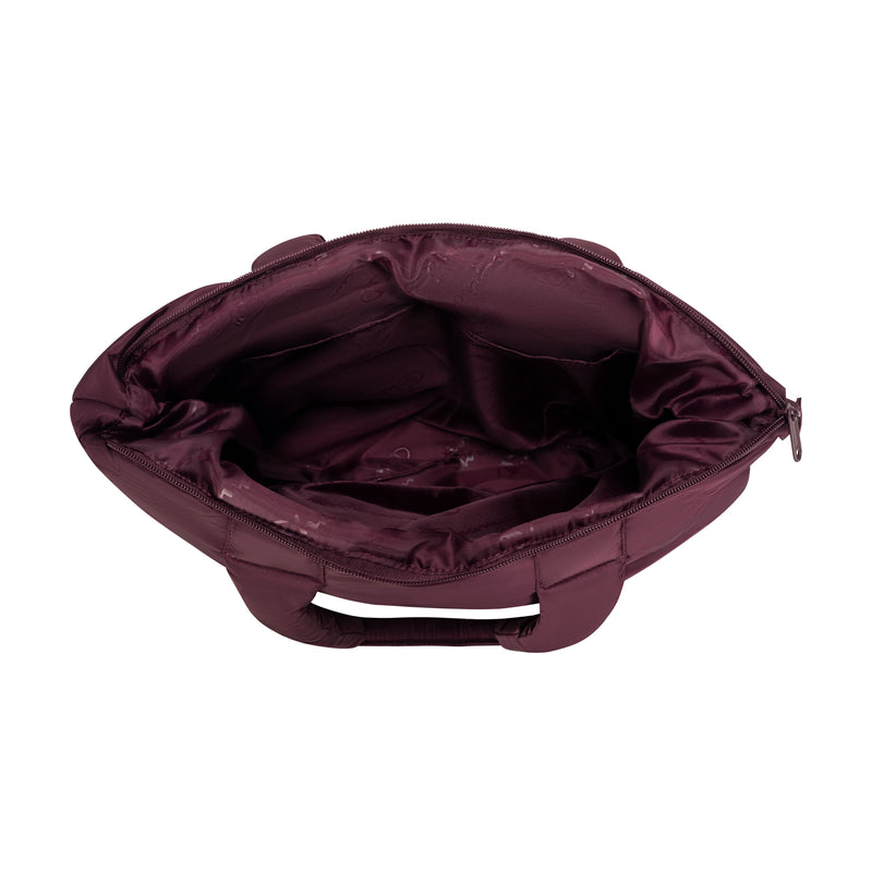 A top view of the open Champion Quilted Billie Tote in maroon, featuring a zipper and spacious lined interior, displayed empty against a white background—ideal for everyday use.