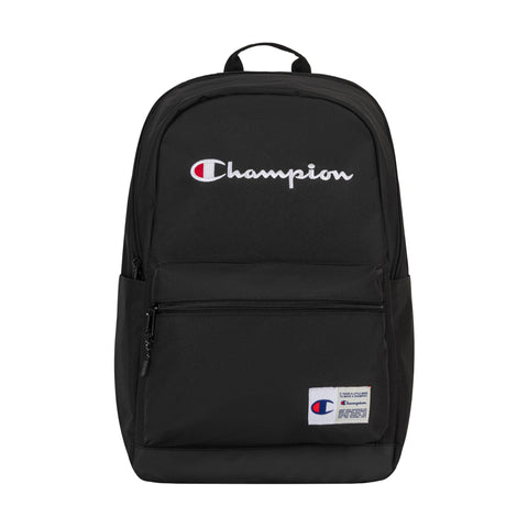 The Champion System Backpack is black with an embroidered white and red Champion logo on the front, a front zip pocket, multiple compartments, and a small white Champion label near the bottom.