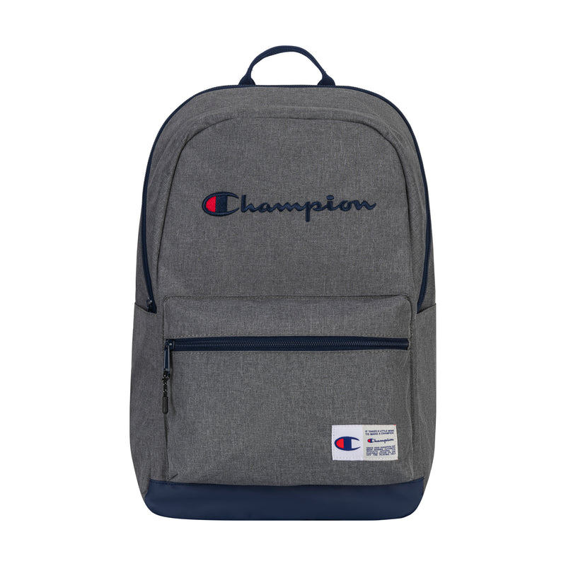 The Champion System Backpack is gray with a navy logo and accents, multiple compartments, a padded laptop sleeve, a front zip pocket, and a small white Champion label on the lower front.
