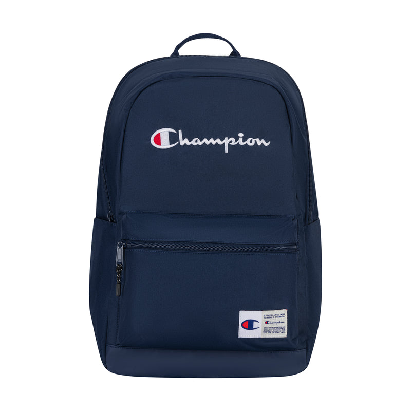 The Champion System Backpack in navy blue features multiple storage compartments, a padded laptop sleeve, front zip pocket, side pockets, top handle, embroidered white and red Champion logo, and a small Champion patch on the lower front pocket.