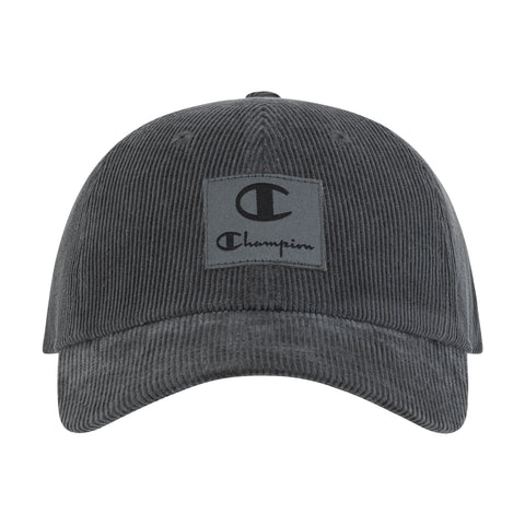The Champion Ridge Corduroy Adjustable Cap is a black cap with a logo, vintage-inspired style, and an adjustable back closure for comfort.
