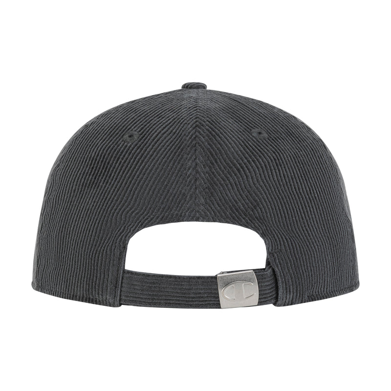 The Ridge Corduroy Adjustable Cap by Champion is a dark gray cap with vintage-inspired style, featuring an adjustable back closure and metal clasp.