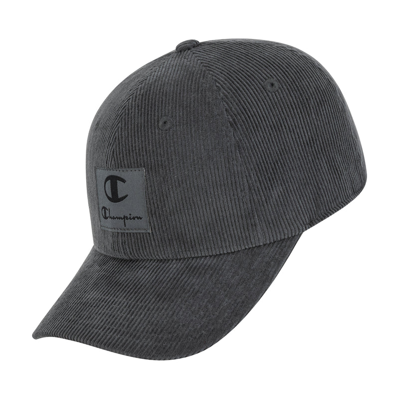 The Champion Ridge Corduroy Adjustable Cap features a dark gray corduroy design, curved brim, front logo patch, vintage style, and adjustable closure. Shown angled against a white background.