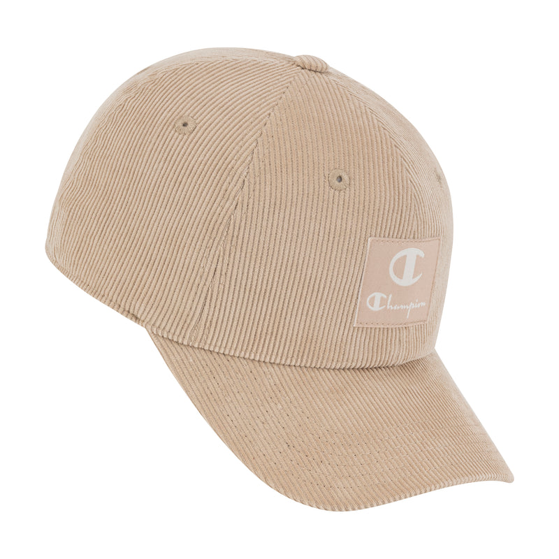 The Champion Ridge Corduroy Adjustable Cap features a beige corduroy build, curved brim, vintage-inspired style, and a rectangular front logo patch. An adjustable back closure ensures a perfect fit.