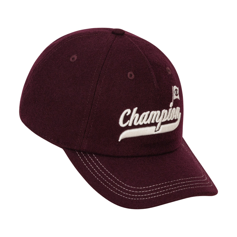 The Champion Sophomore Adjustable Cap features white stitching and "Champion" with a small flag embroidered in white on maroon, adding classic collegiate style to your look.